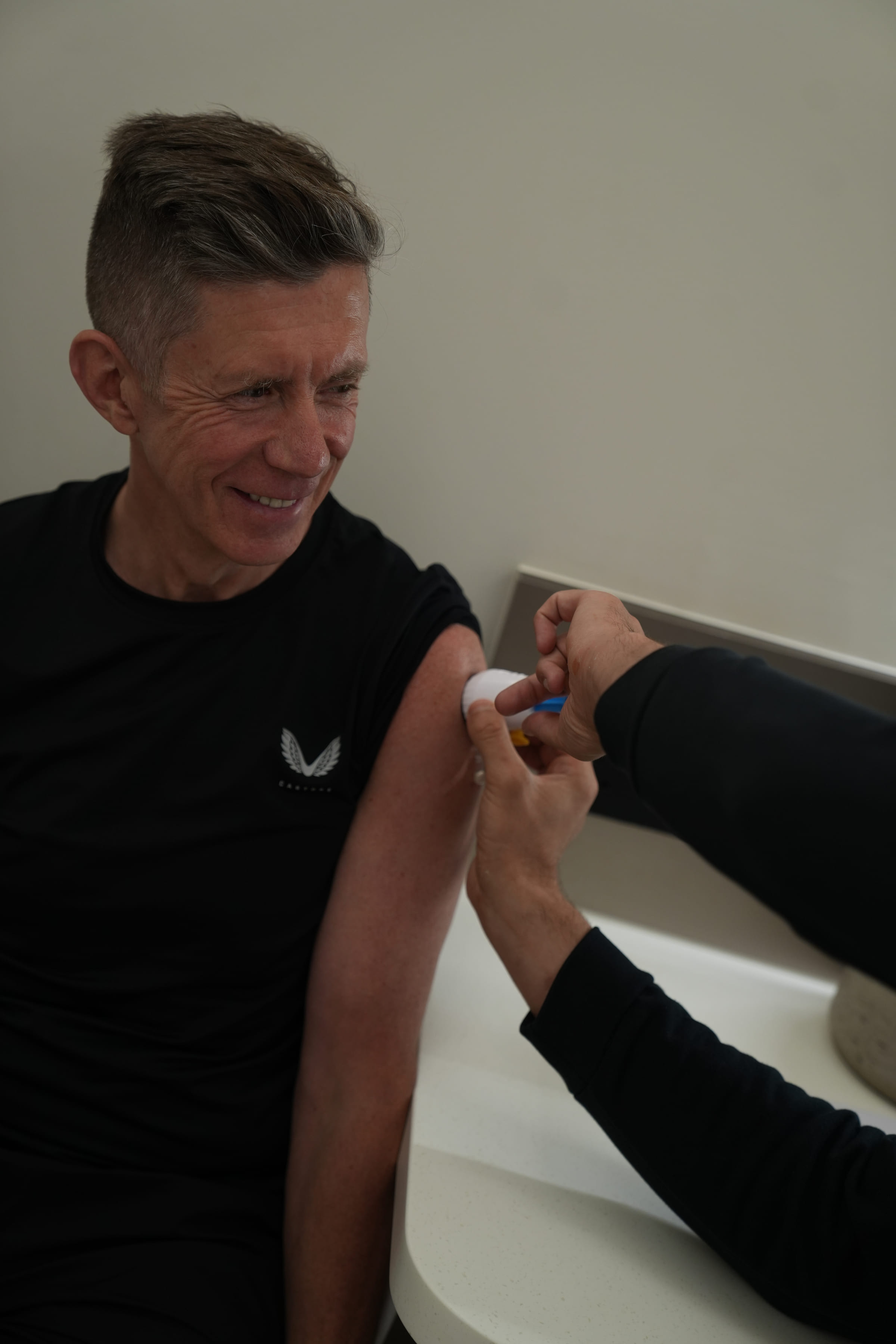 A blood sample being taken from a client's arm during the initial assessment